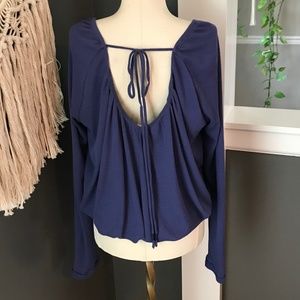 Free People’s We The Free thermal with tie back detail. Scoop neckline